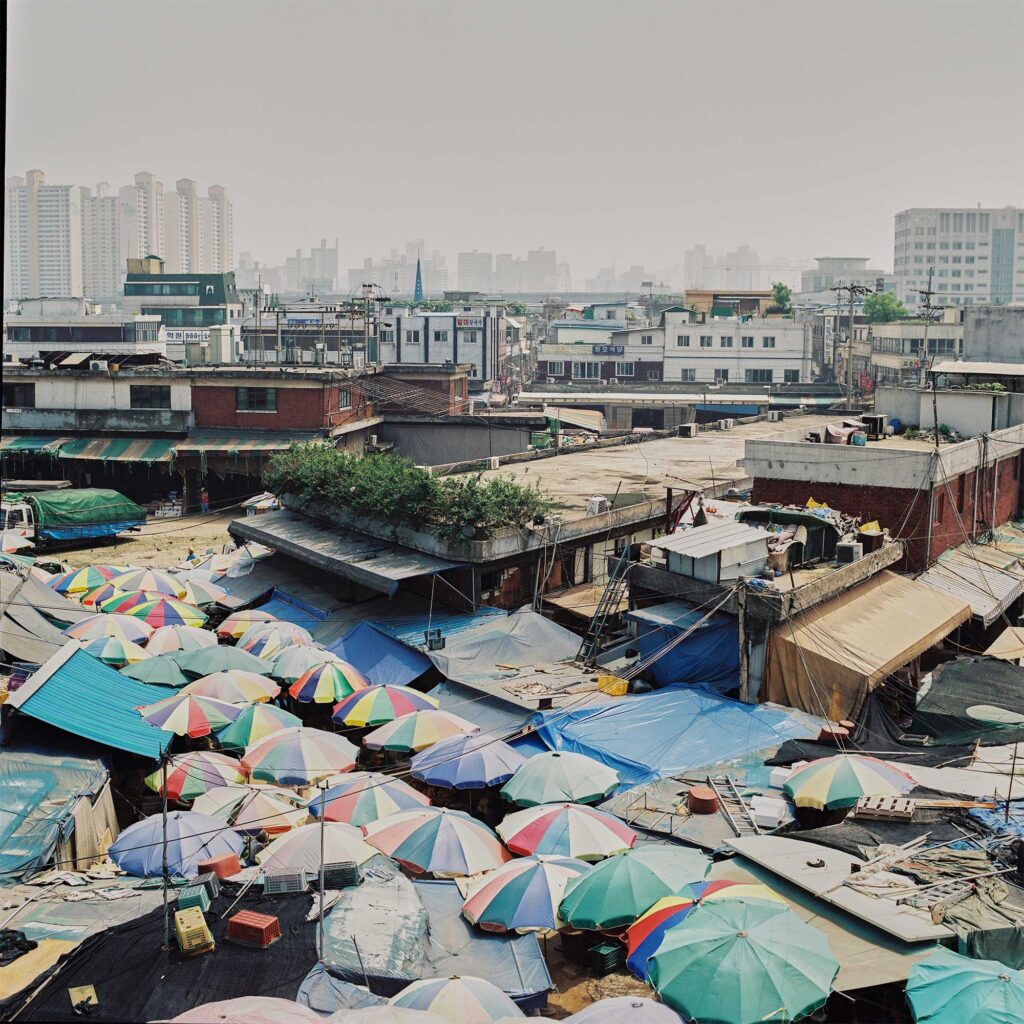 Rainbow-colored umbrellas at Cheongyangri market, Seoul, South Korea