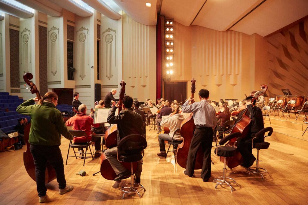 Music students from Pyongyang Kim Won Gyun Conservatory practice with Munich Chamber Orchestra musicians during their visit to Pyongyang