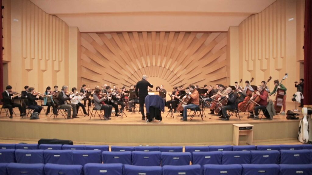 Music students from Pyongyang Kim Won Gyun Conservatory practice with Munich Chamber Orchestra musicians and conductor Alexander Liebreich during their visit to Pyongyang