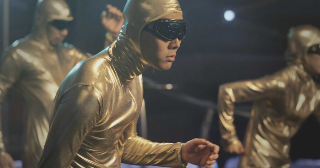 M83's Moonchild music video showing aliens dancing in sync.