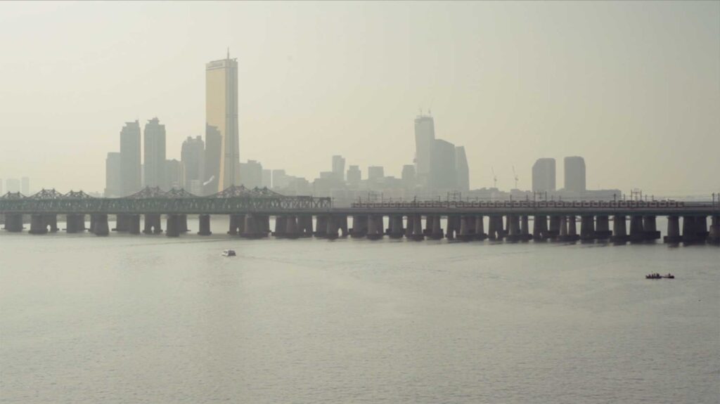 Sincity Music Video - The Yeouido skyline in Seoul, South Korea, with the Han River and the Hangang Bridge stretching out in the forefront