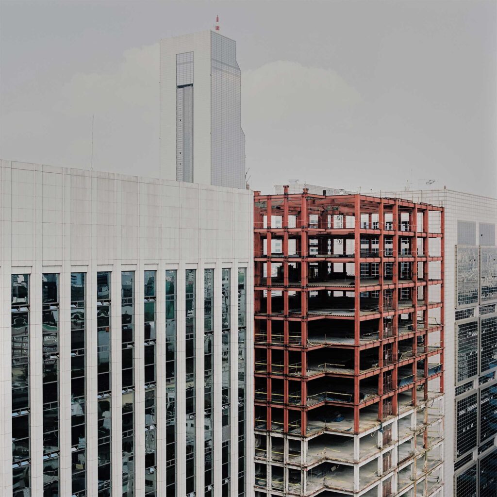 High-rise office buildings surround a new structure under construction in Gangnam district, Seoul, South Korea