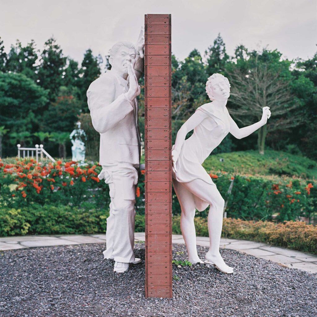 Man and woman devided by wall with penis penetrating through wall a woman from behind in Loveland Sculpture Park on Jejudo Island, South-Korea