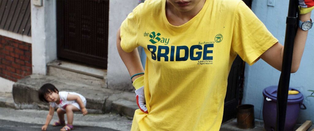 A sound operator on location of a film set for a documentary short film project in Seoul, South Korea, in between takes