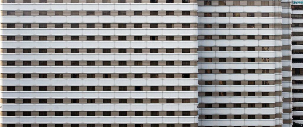 Massive facade of a concrete high-rise building in Gangnam, Seoul, South Korea
