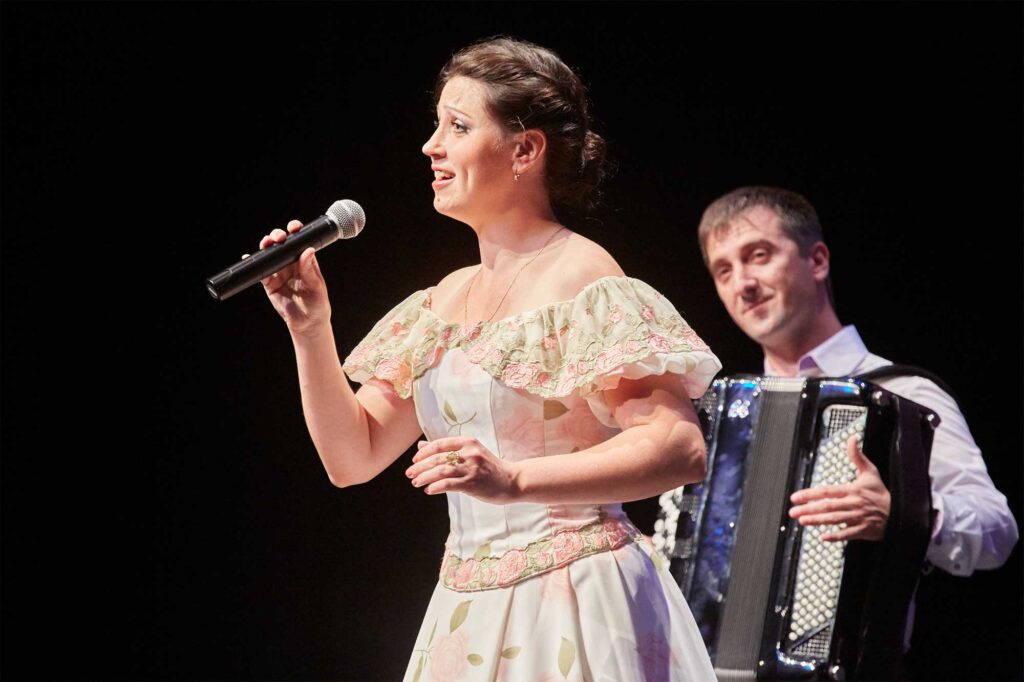 Russia’s National Day event at the World Exhibition in Yeosu, South Korea, showcasing a vibrant Russian folklore music performance.