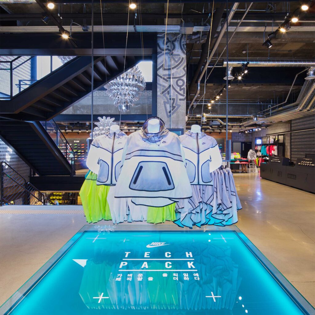 An artistic installation highlighting the latest trendy fashion at Nike's largest store in Korea, showcasing all-purpose sportswear in Gangnam, Seoul.
