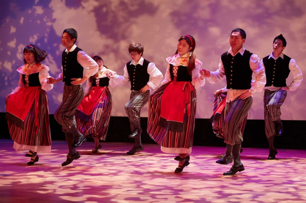 Sweden’s National Day event at the World Exhibition in Yeosu, South Korea, featuring a lively Swedish folklore dance performance.