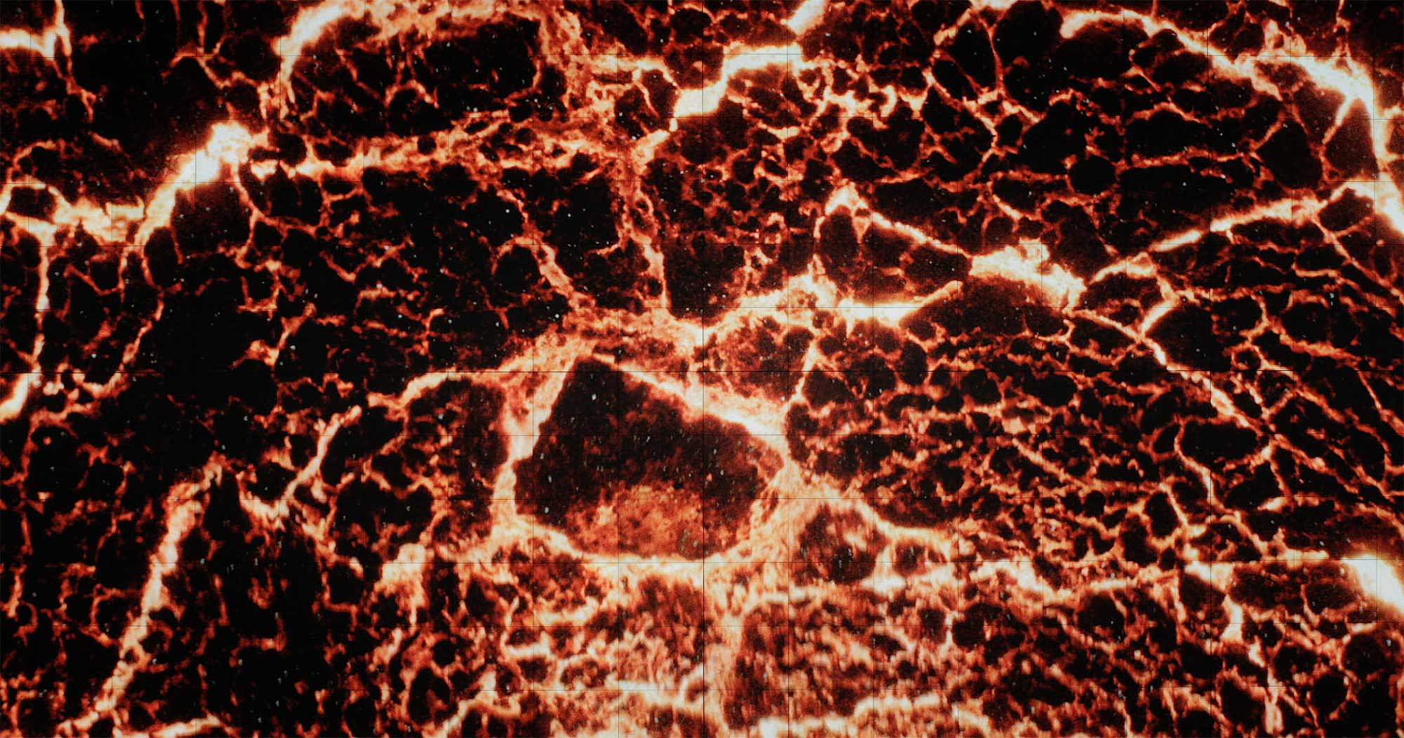 Close-up of melting steel displayed on the Vision Hall Media Wall, featuring Universal Everything's dynamic art piece at Hyundai Motor Group University, Mabuk Campus, South Korea.