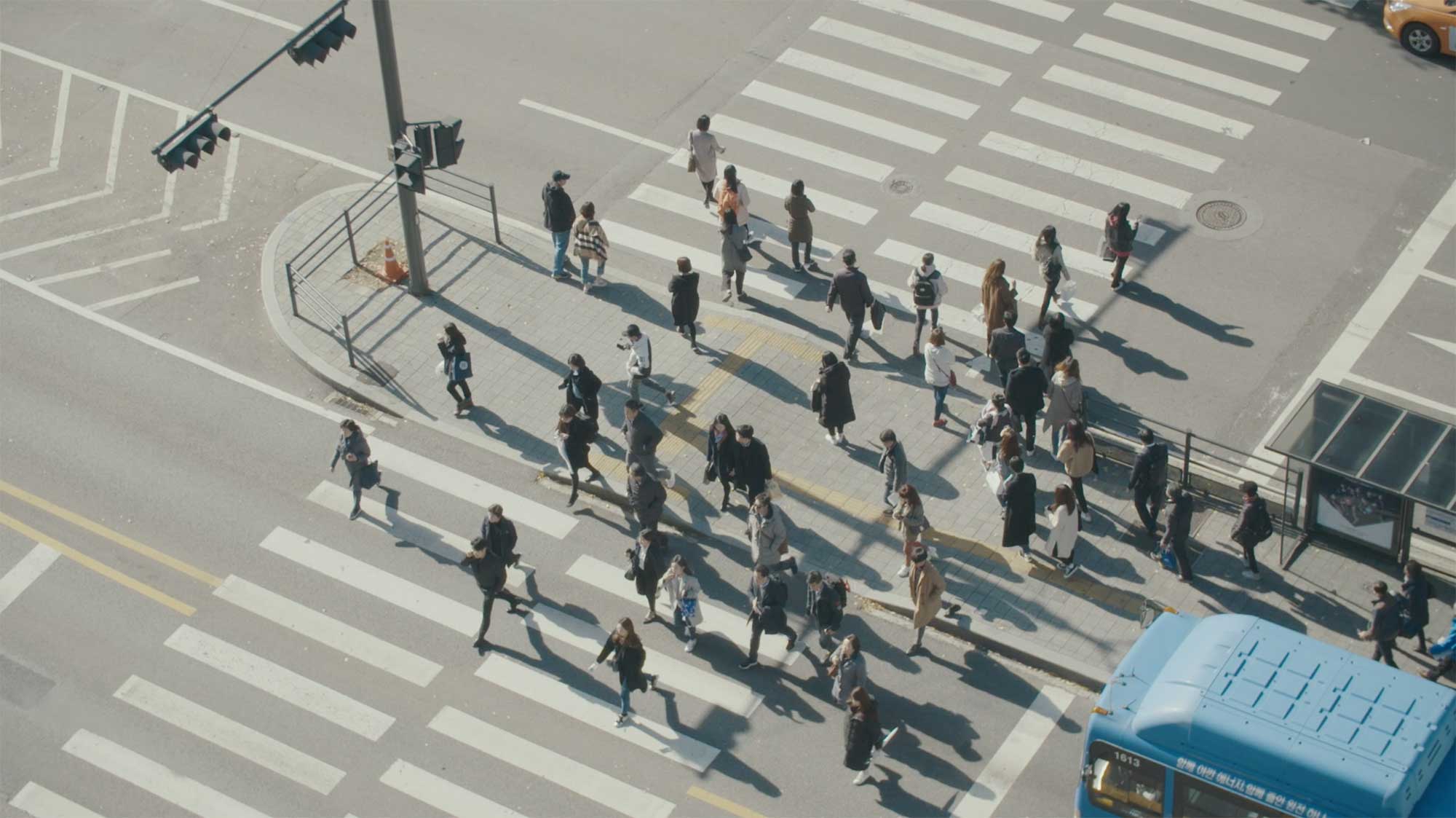 Busy zebra crossing seen from above in Gangnam district, Seoul, South Korea.