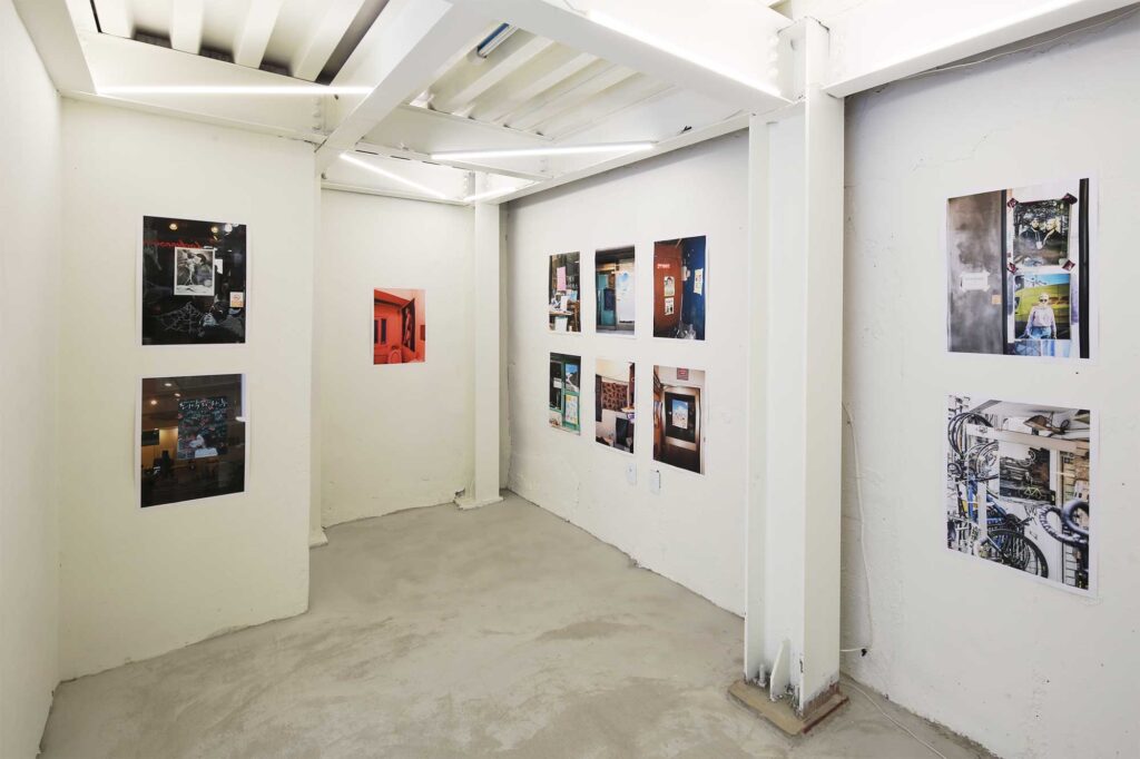 A section of exhibition space adorned with posters for the poster exhibition in Seoul, South Korea, by Graphic Magazine as part of Propaganda Press.
