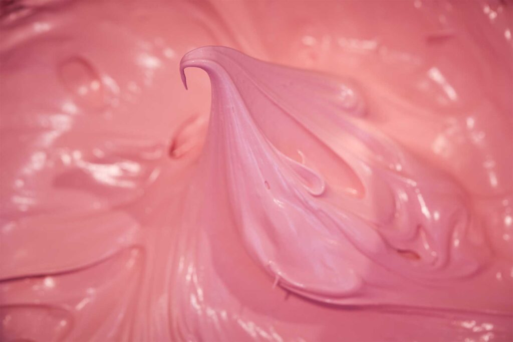 Pastry chef Eun Jeong Lee mixes pink macaron dough at EJ Baking in Seoul, photographed for the ELLE & VIRE PROFESSIONNEL PRINT MAGAZINE series.