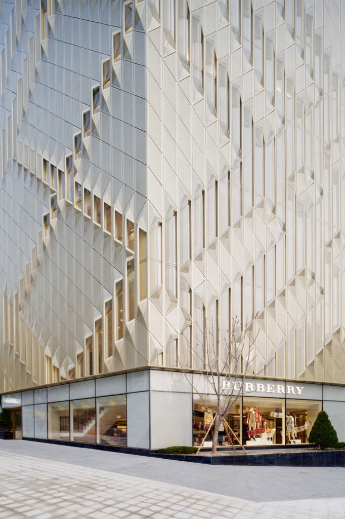The intricately ornamented facade rises above the entrance of The Burberry Flagship Store, showcasing its stunning architecture in Gangnam, Seoul, South Korea.