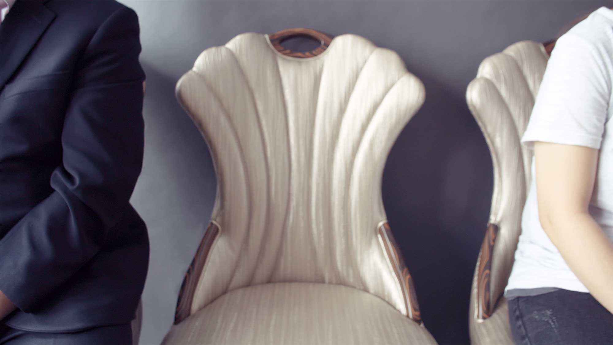 A husband and wife pose for a family portrait, leaving an empty chair for their daughter, who was among the many lives lost in the Sewol ferry disaster in South Korea.