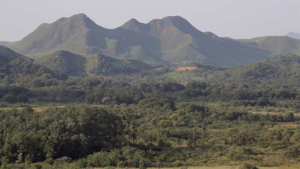 Mountain landscape overlooking DMZ near small village Yangjiri, Cherwon, Kangwando Province, facing North Korean territory in short film ART ATTACK.