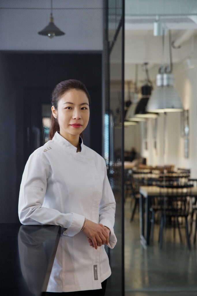 A portrait of pastry chef Eun Jeong Lee in the cafe at EJ Baking studio in Seoul, captured for the ELLE & VIRE PROFESSIONNEL PRINT MAGAZINE series.