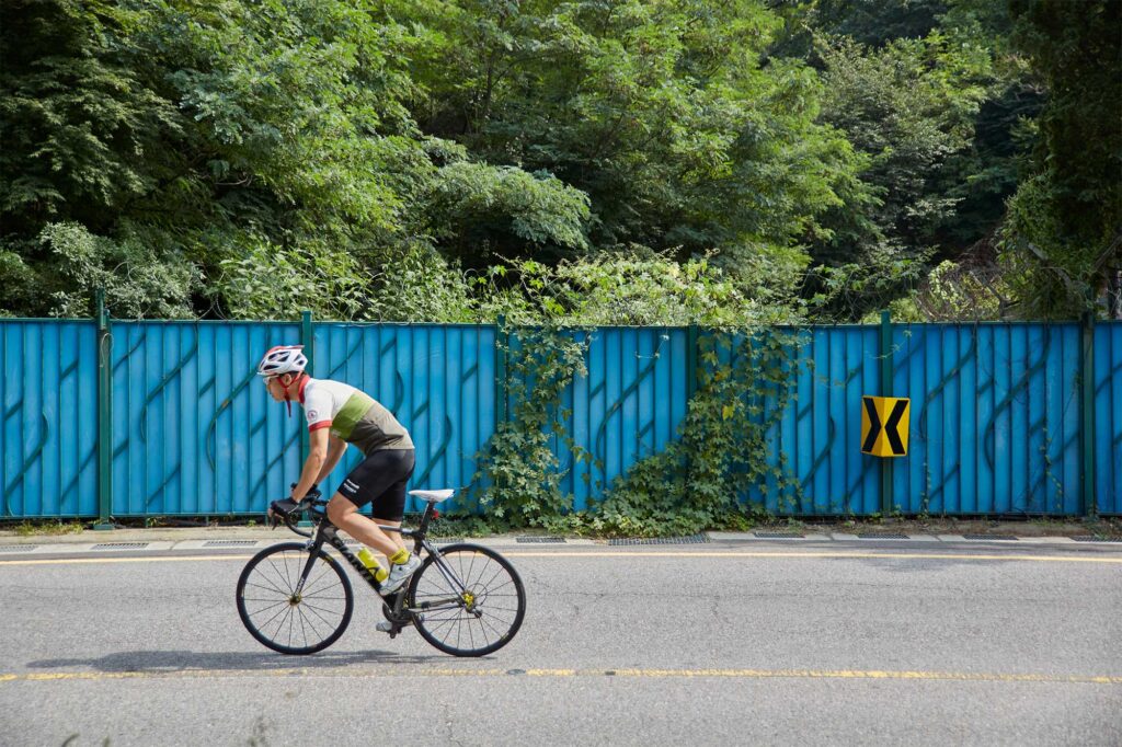 So Wonyoung, a road cycling enthusiast, races up a scenic route in the Bukhansan area, north of Seoul, South Korea.