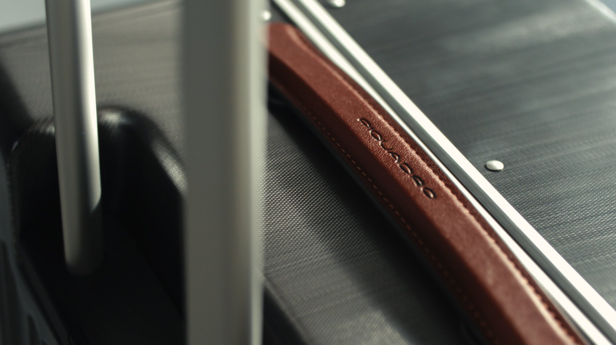 Piquadro PQLM trolley handle detail from Jung Sung Il campaign Seoul