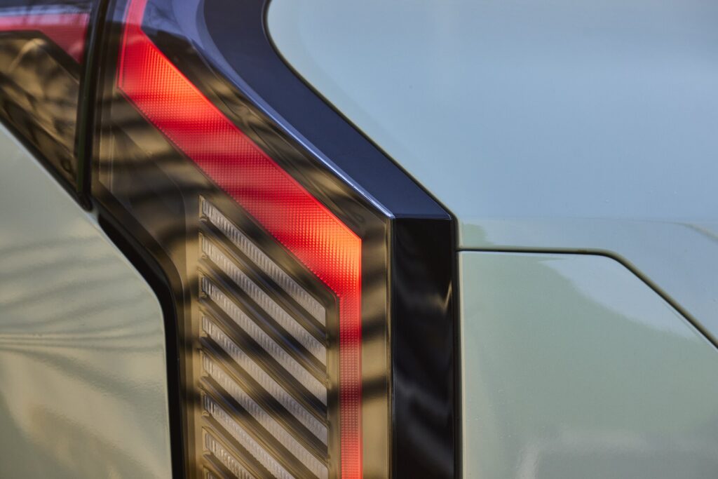 Kia EV3 rear light contrasting with hanok surroundings in Gyeongju.