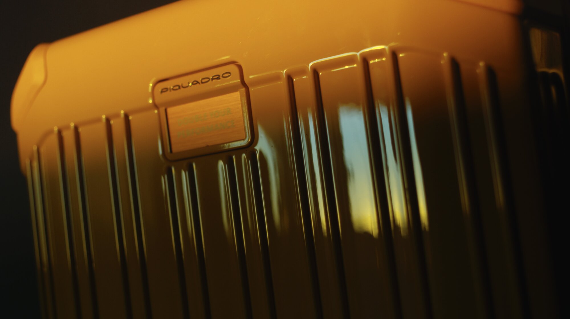 Piquadro PQLM trolley logo and shell detail from Seoul campaign