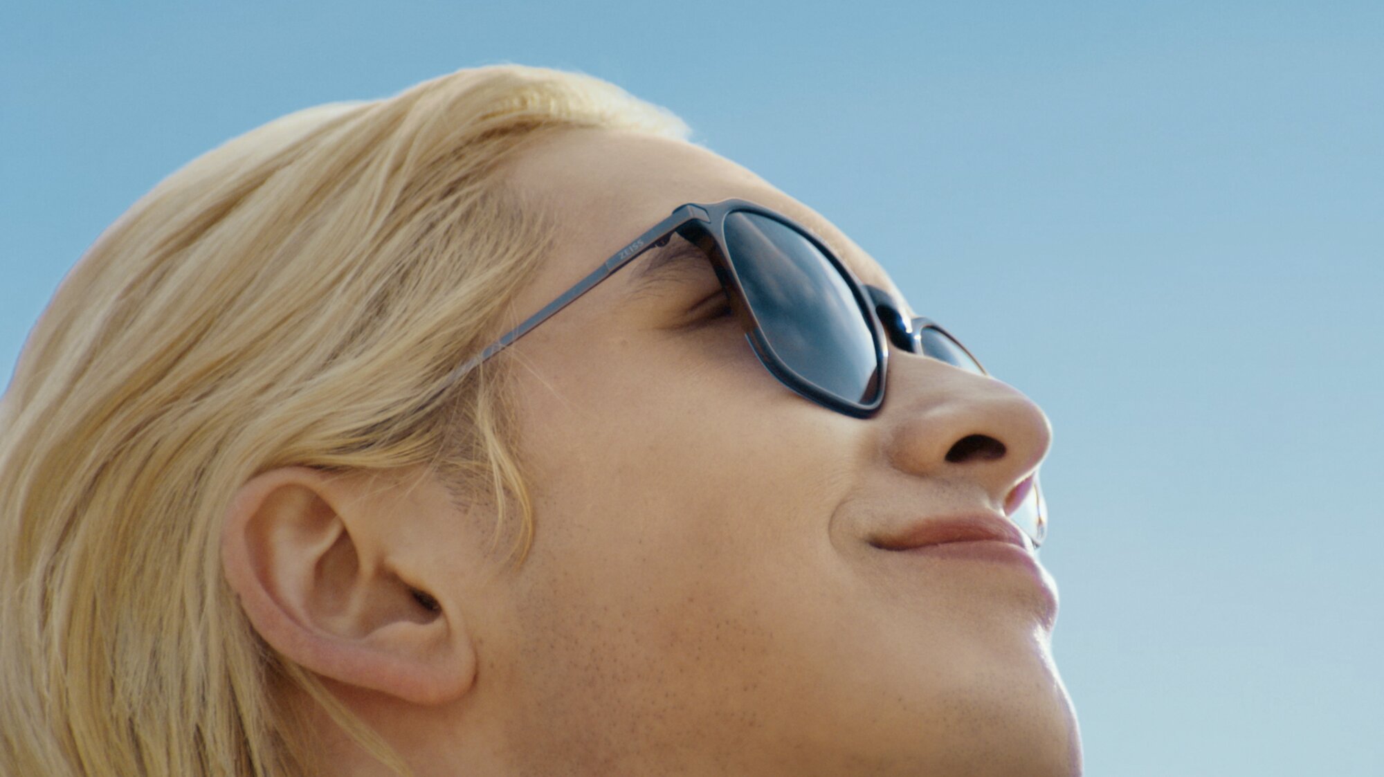 Outdoor portrait of model wearing ZEISS sunglasses in Seoul