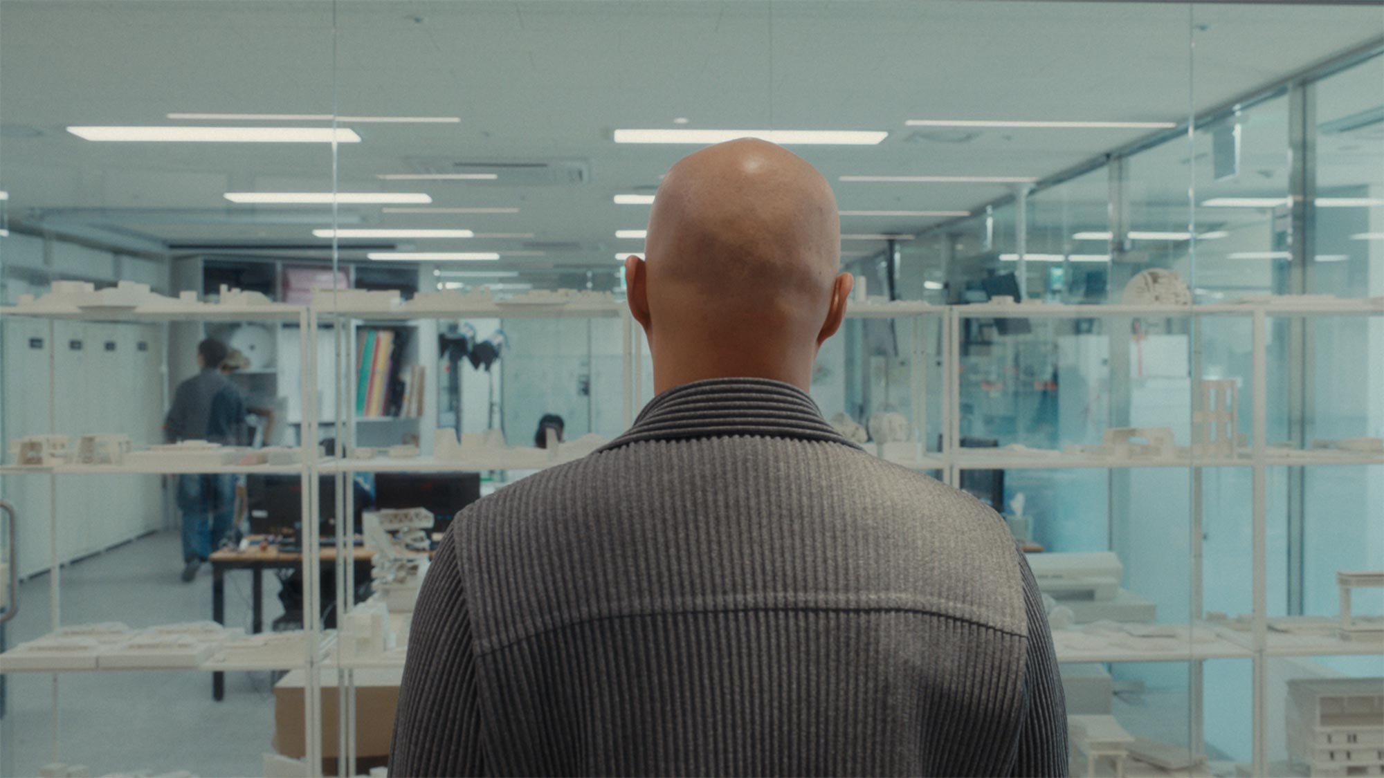 Onejae Lee viewed from behind inside OJL Studio architecture studio