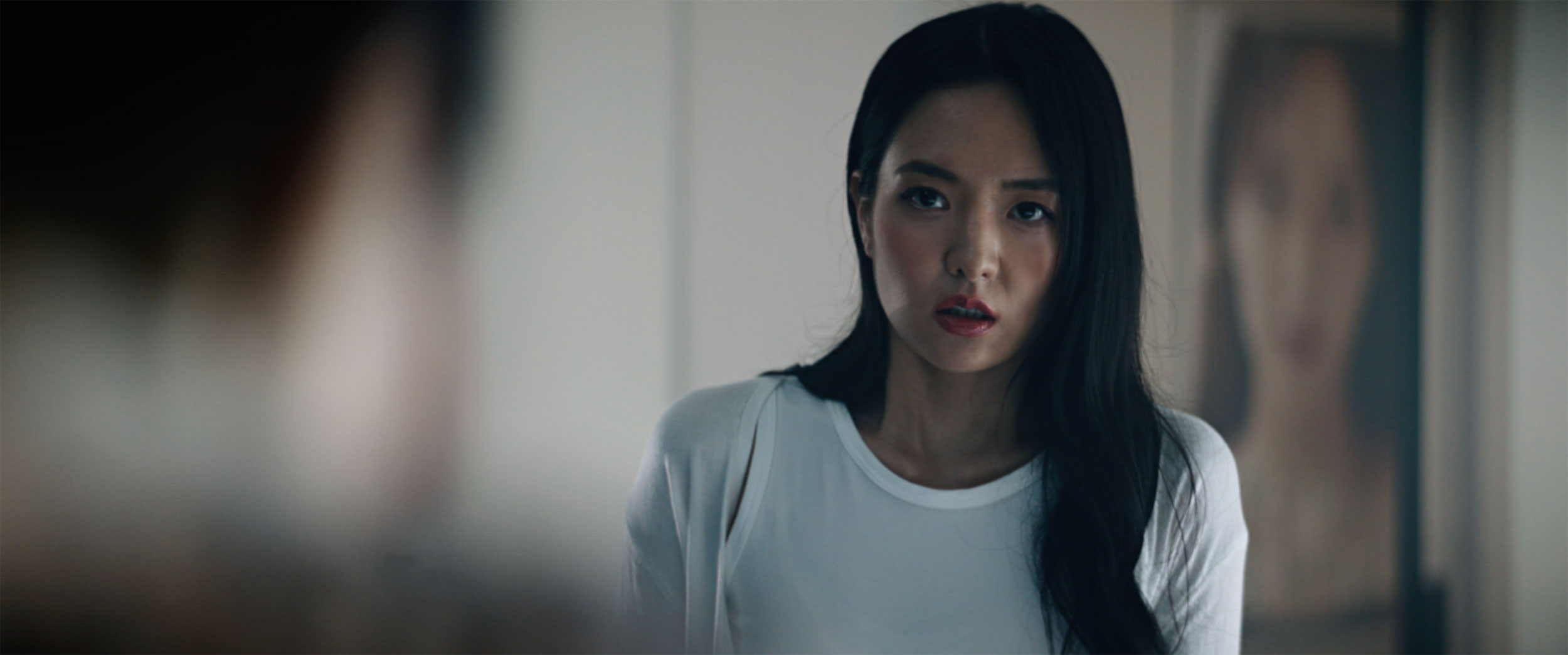 Hojo Shin as K-pop star Hye-mi inside her luxury penthouse in IDOLS