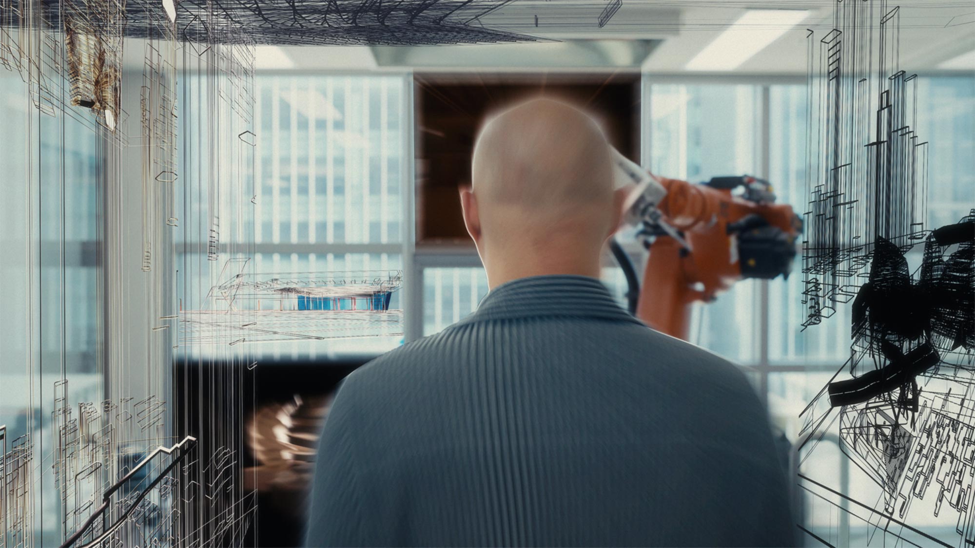 Onejae Lee surrounded by architectural drawings and digital animation