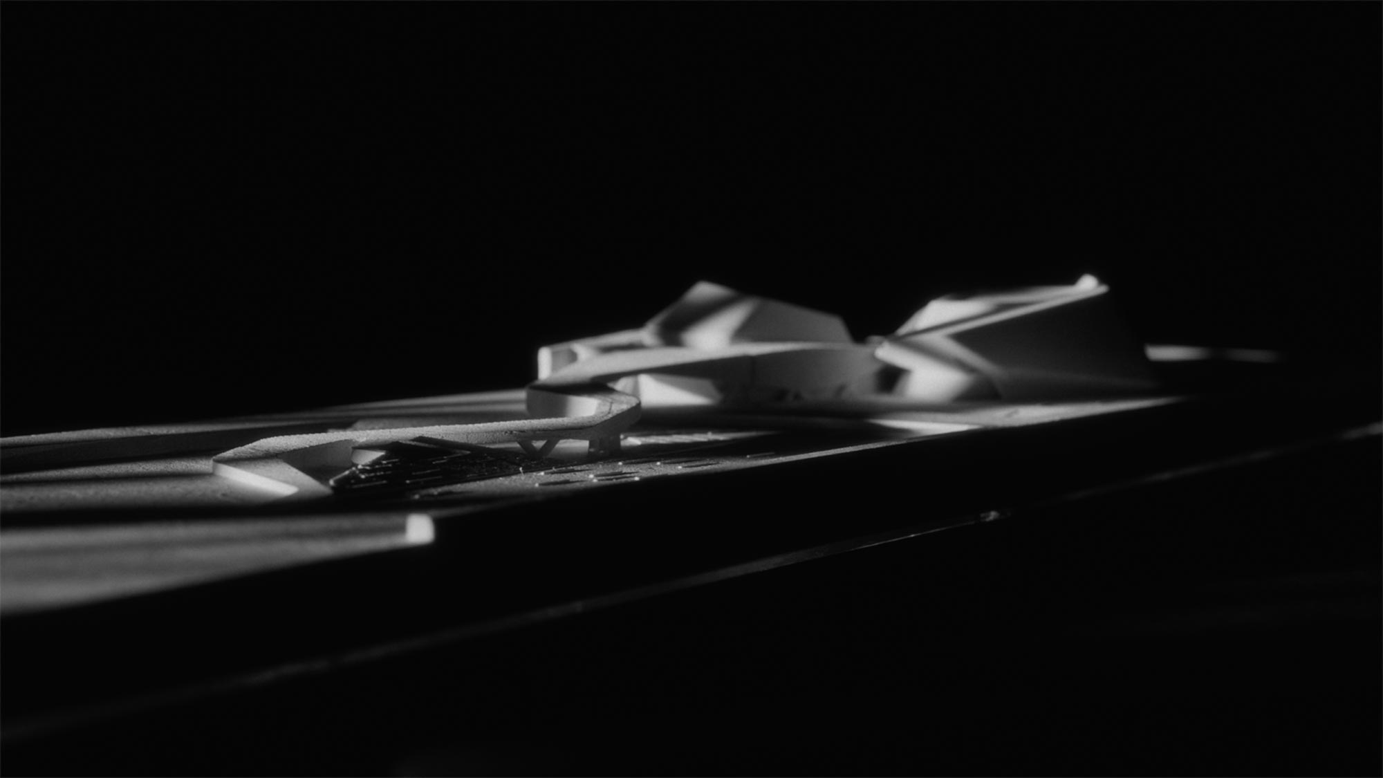 Architectural model with curved walkway in dramatic light