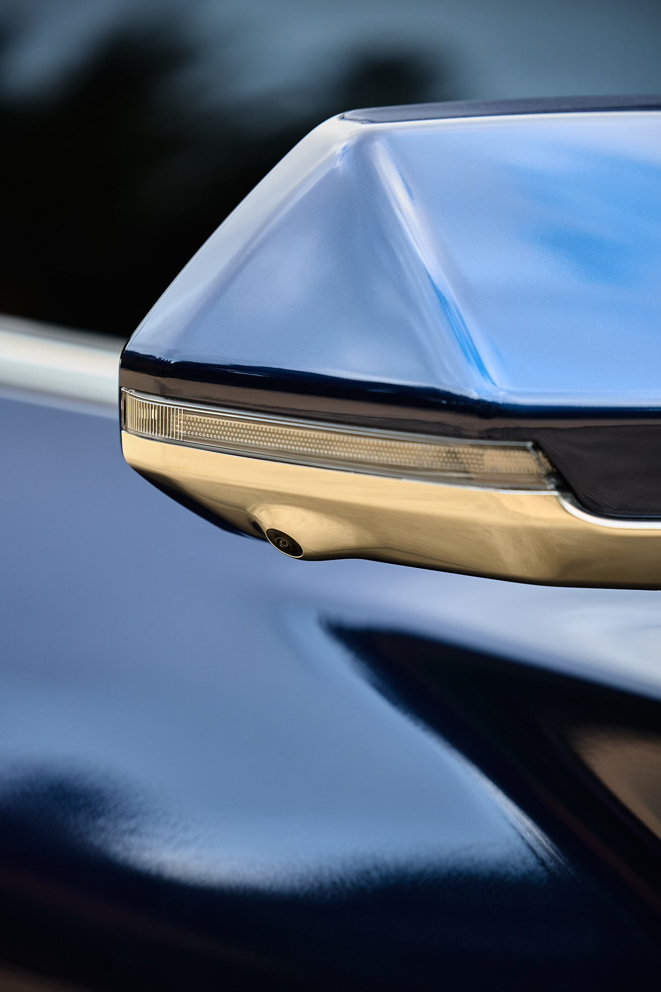 Close-up of Kia EV5 side mirror and sculpted bodywork