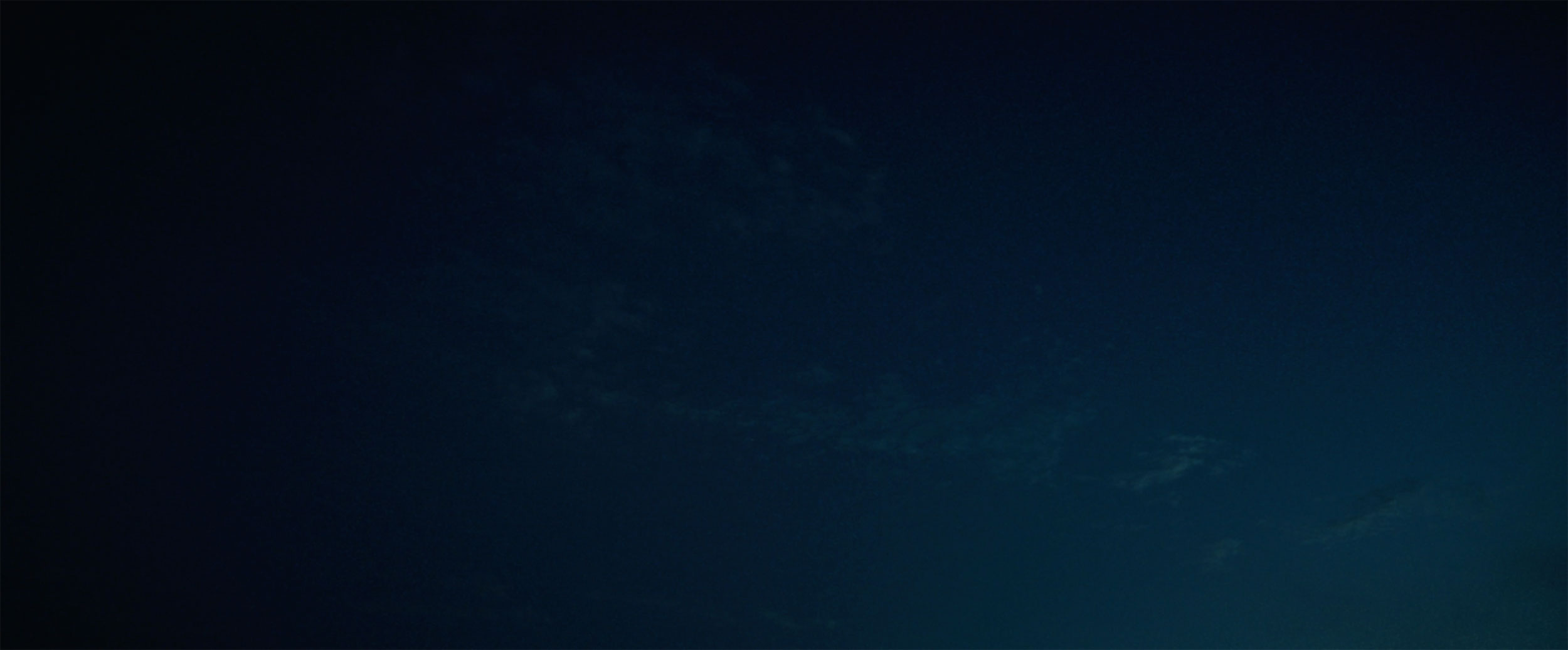 Dark blue night sky establishing shot in Korean short film IDOLS