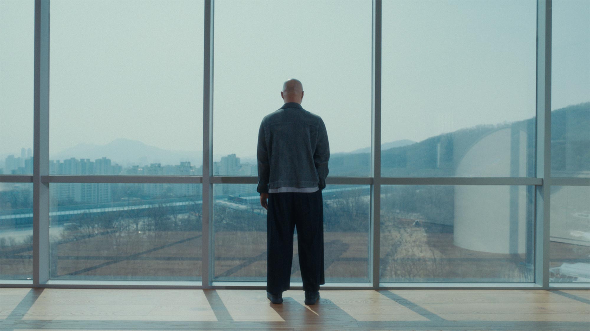 Architect Onejae Lee overlooking Korean landscape