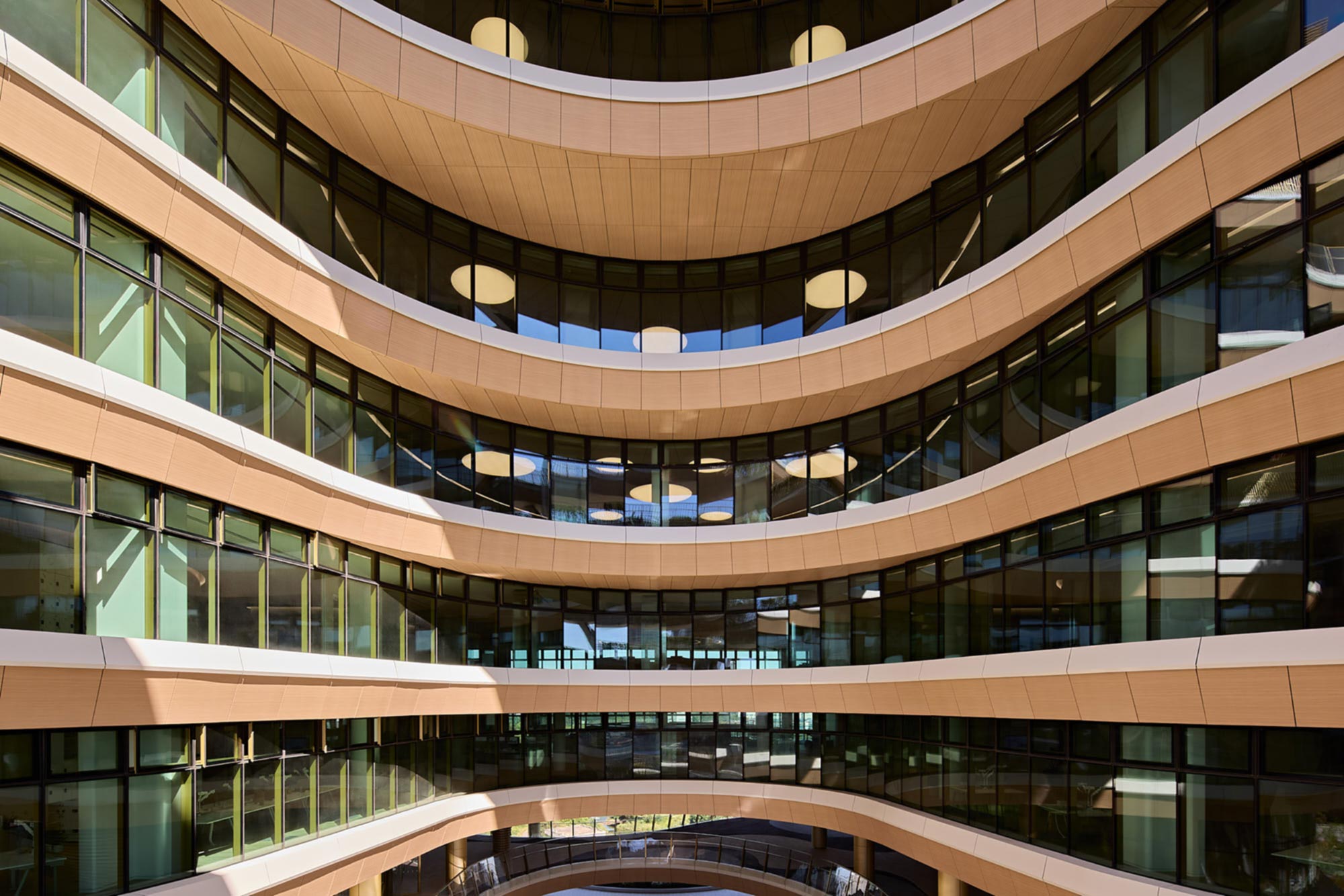 Curved facade and atrium at Hana Bank Headquarters by NBBJ