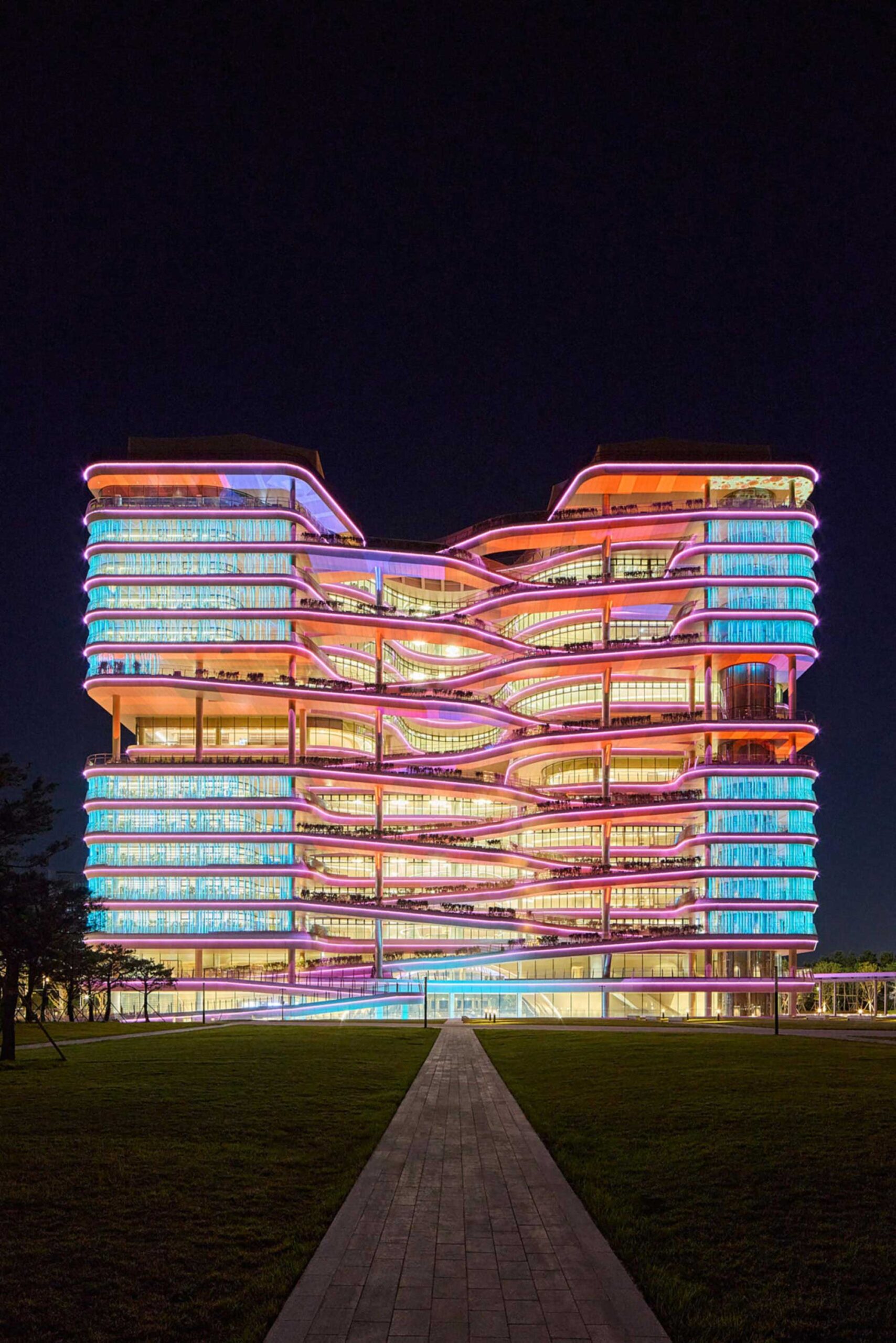 Colorfully illuminated Hana Bank Headquarters by NBBJ at night